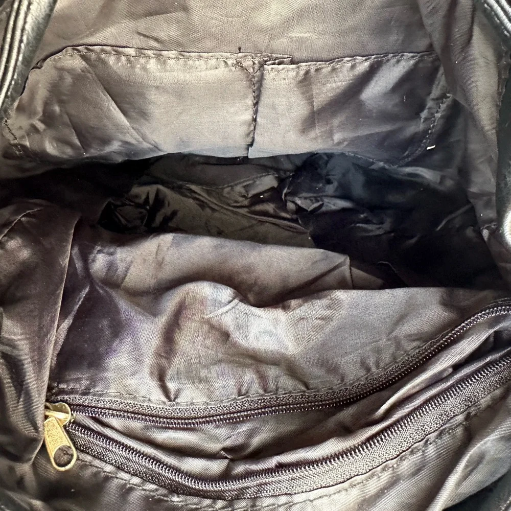 Black Faux Leather Drawstring Backpack with Gold Buckle Accent